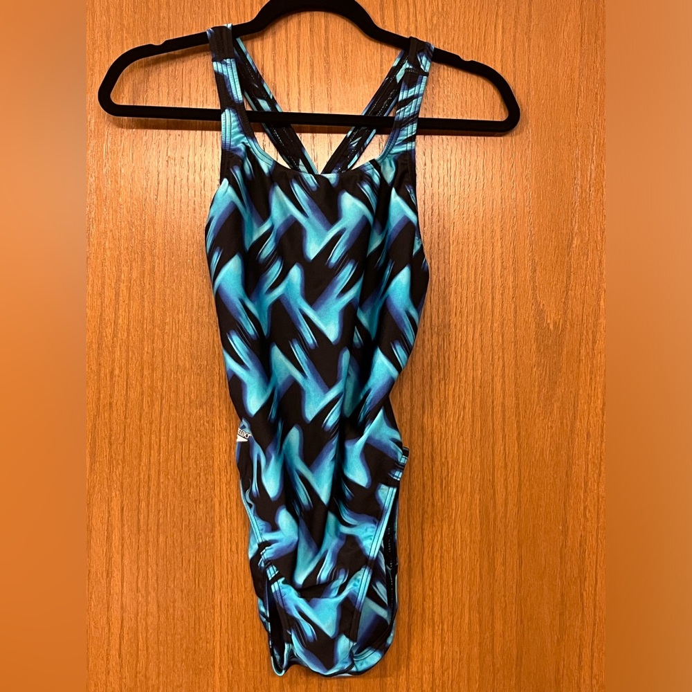 Speedo swim suit. Racer back with keyhole style. Size 38.